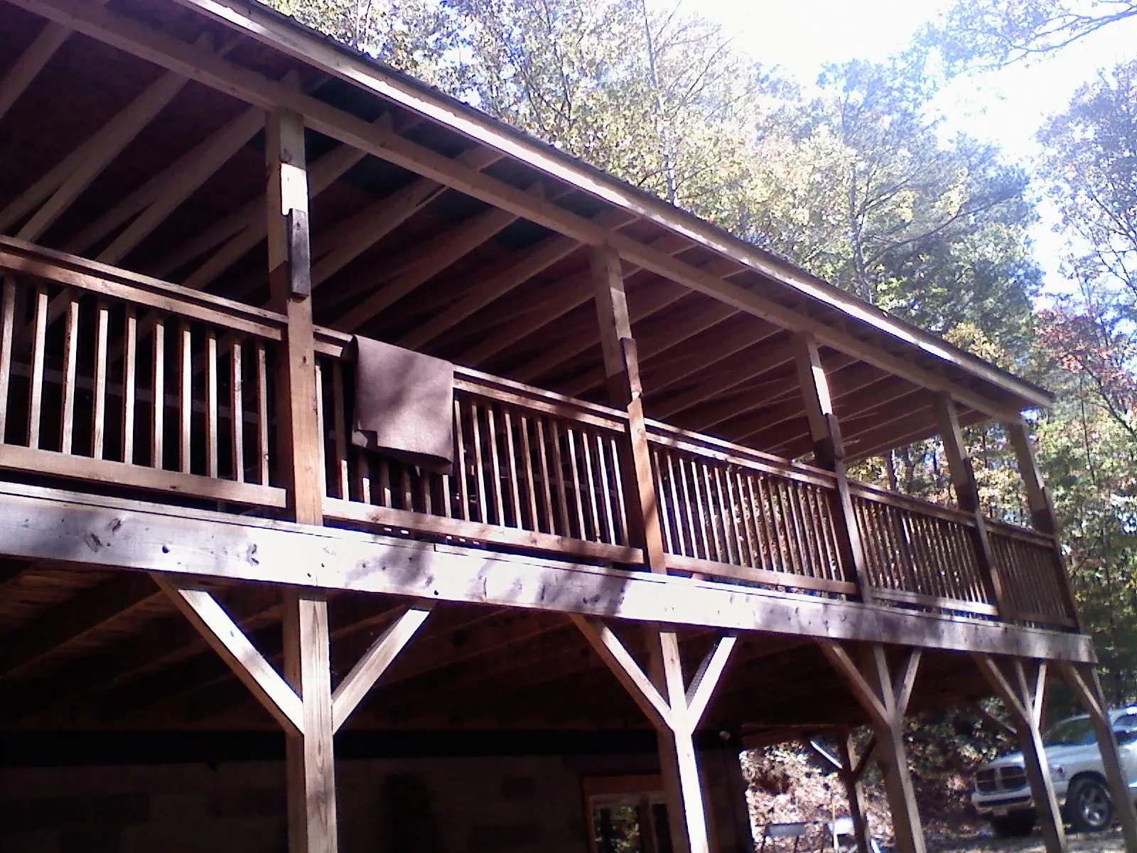 Timber framing under a new elevated porch and deck — Roof Leak Repair in Davis City by Roofing Brothers